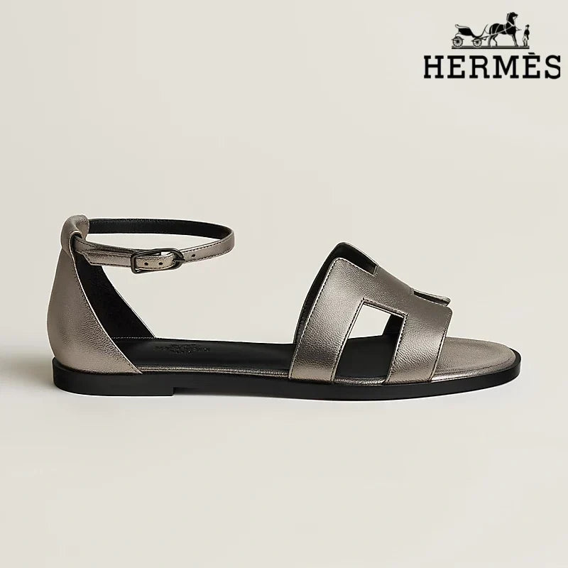 Herm¨¨s Metallic Pewter Leather Ankle Strap Sandals with H Cutout