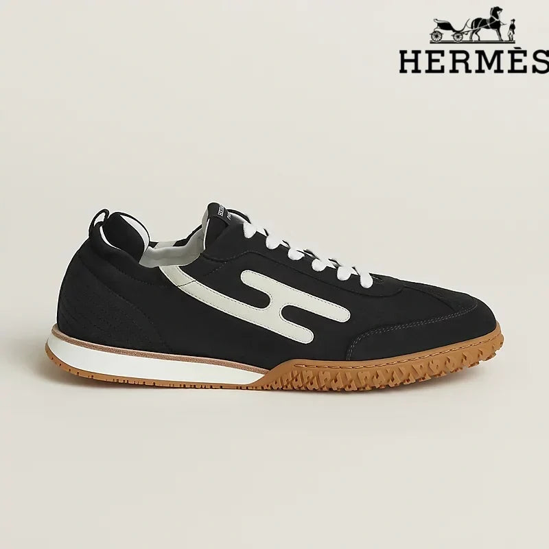 Herm¨¨s Black and White Bouncing Sneakers
